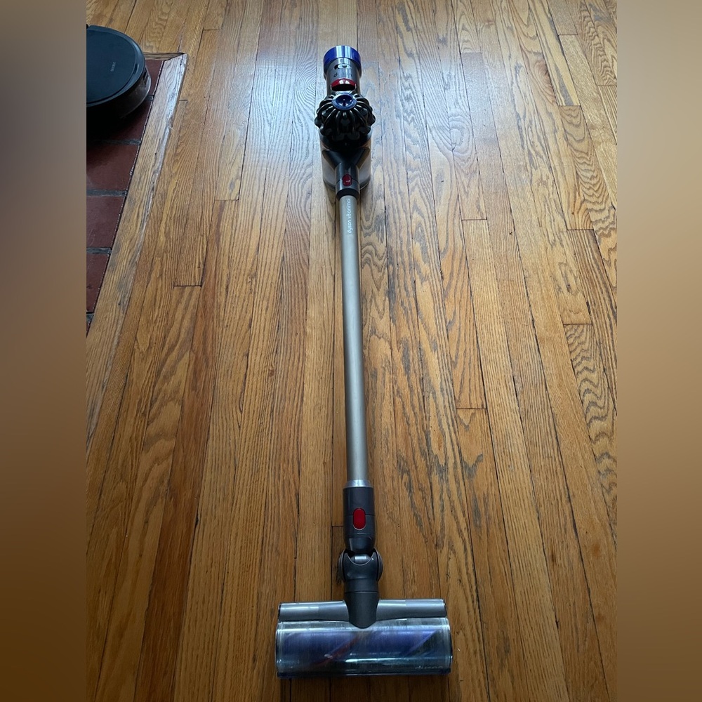 Dyson V-8. Used, needs a new battery. I do not feel like ordering.